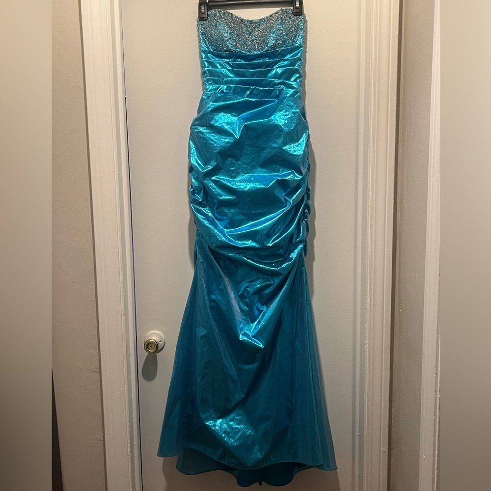 Strapless Metallic Teal Mermaid Prom Gown with Beaded Bodice By Joli Prom